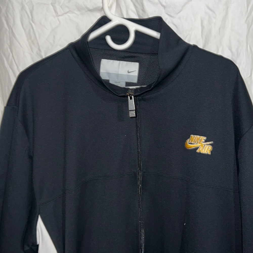 Black and yellow XXL Nike zip up warm-up shirt.
